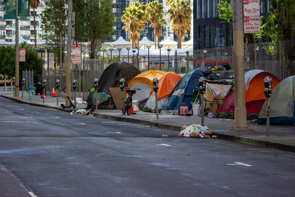 Preventing Homeless Encampments on Your Property with Live Remote Guarding